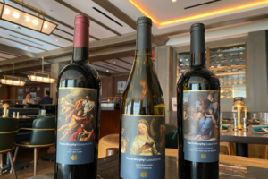 Notre Dame Family Wines - The Raclin Murphy Museum of Art Line. From left to right, Brutocao 2017 Uber Tuscan, AuburnJames 2020 Chardonnay, and Louis M. Martini 2019 Napa Valley Cabernet Sauvignon.