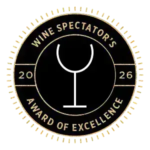 Black and gold Wine Spectator's Award of Excellence 2026 seal with a white wine glass icon.
